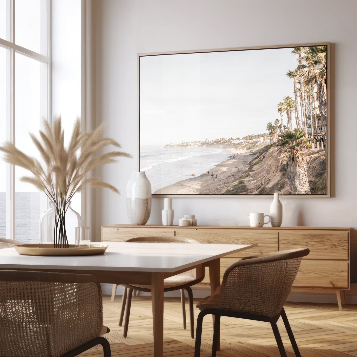 Horizontal, California coast print featuring a high vantage point overlooking Pacific Beach, with tall palm trees, a sandy beach, and the ocean. This coastal print offers a beautiful seascape. Photograph in minimalist mock up.