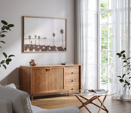 Landscape coastal photography of Oceanside, California, featuring a row of charming beachfront houses with the Oceanside Pier and ocean in the background. Photograph in minimalist mock up.