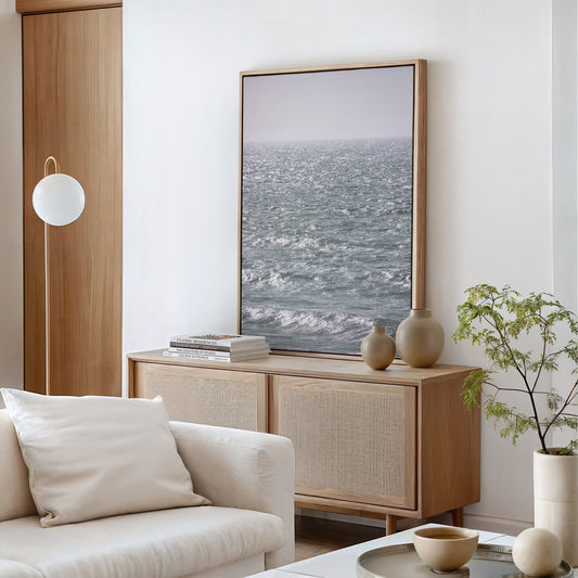 Vertical fine art photography ocean print. Muted tones create a serene atmosphere, perfect for modern coastal decor.