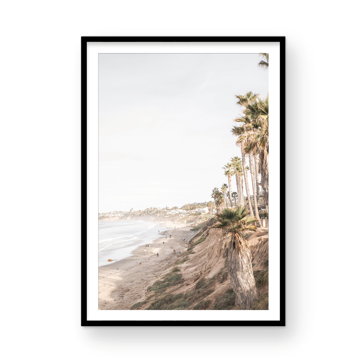 Vertical California coast print featuring a high vantage point overlooking Pacific Beach, with tall palm trees, a sandy beach, and the ocean. This coastal print offers a beautiful seascape. Photograph in minimalist mock up.