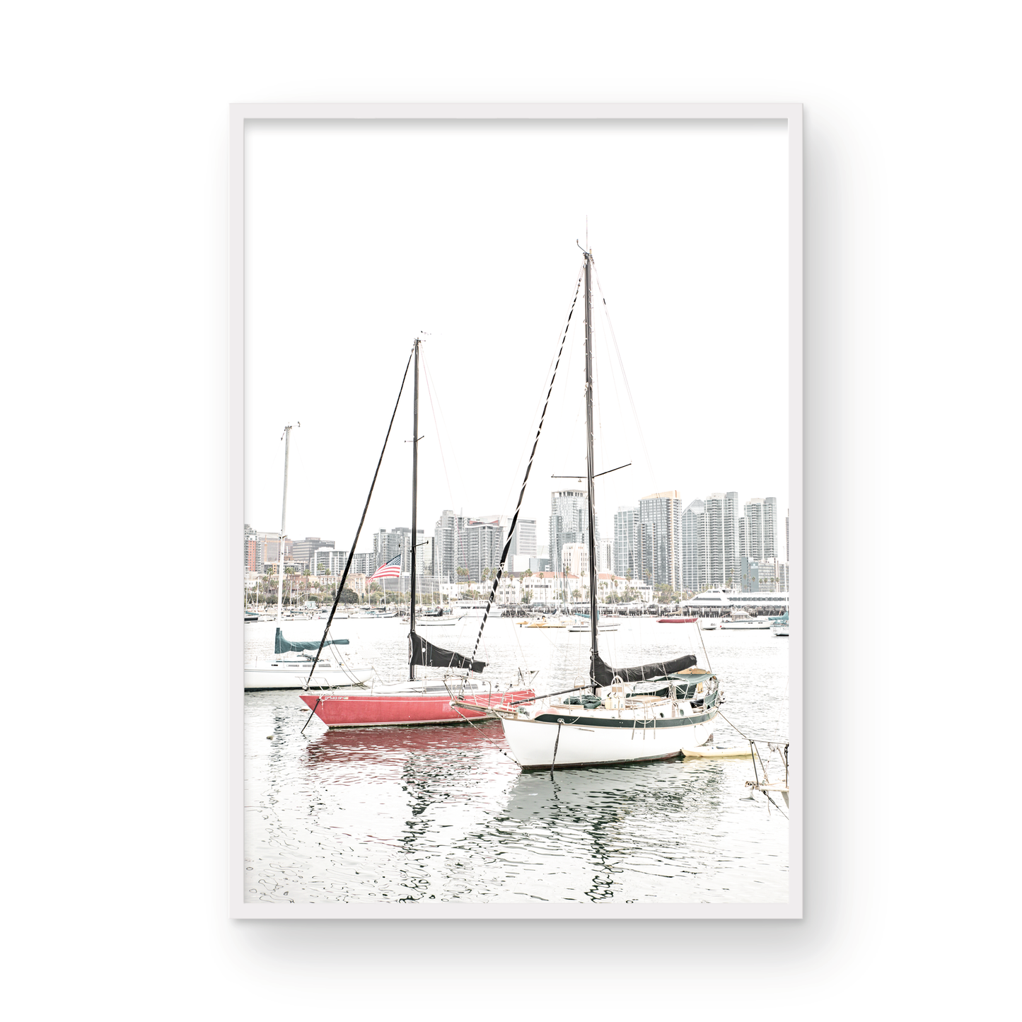 A vertical San Diego print showcasing numerous sailboats in San Diego Harbor with the city skyline in the background. This modern coastal print embodies the Southern California coastal photography, perfect for a large beach wall art. Photograph in minimalist mock up.