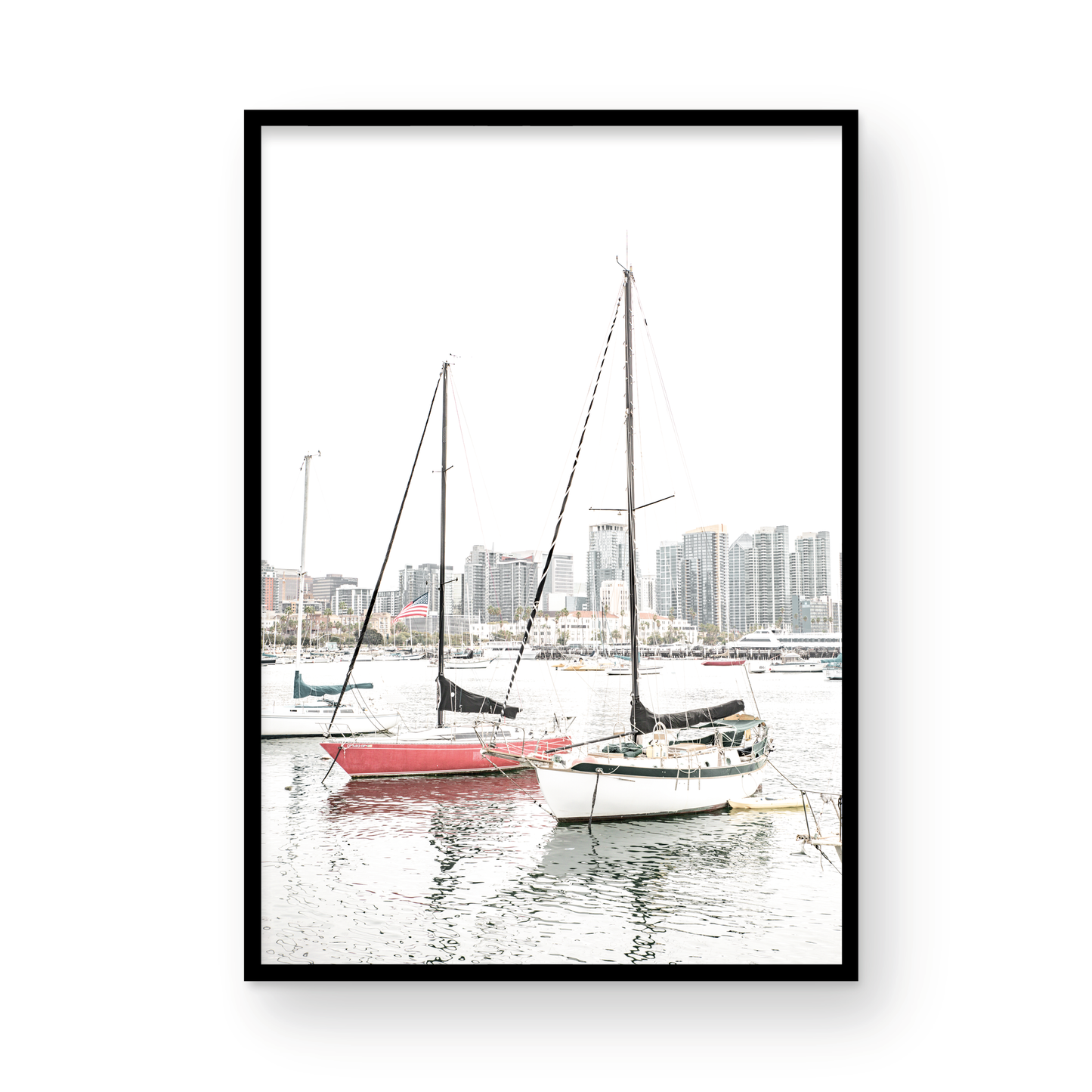 A vertical San Diego print showcasing numerous sailboats in San Diego Harbor with the city skyline in the background. This modern coastal print embodies the Southern California coastal photography, perfect for a large beach wall art. Photograph in minimalist mock up.