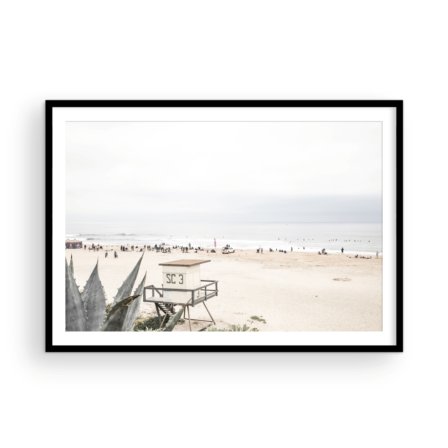 Landscape beach photography of Salt Creek Beach, with lifeguard tower SC 3 in the foreground, and many people enjoying the beach and ocean in the distance. A beach vibes print. Photograph in minimalist mock up.