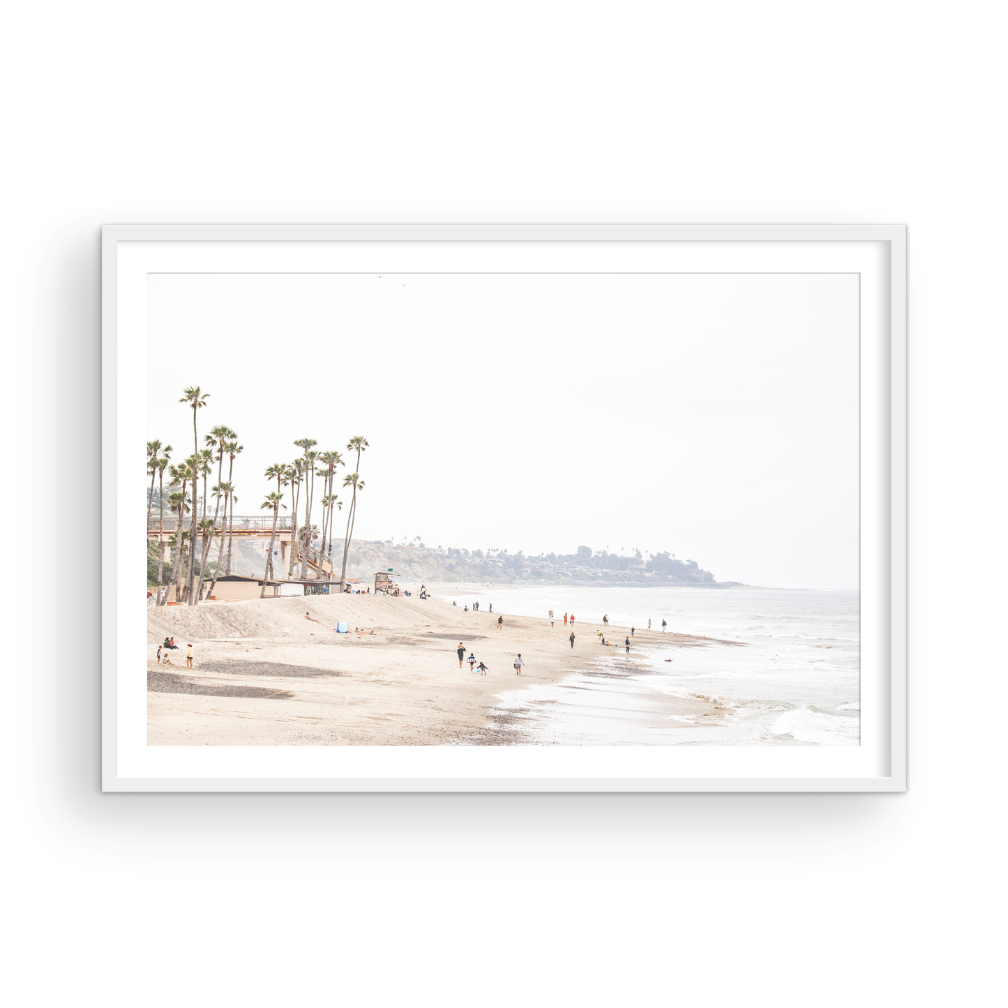 Landscape coastal photography of a wide sandy beach at San Clemente State Beach, with tall palm trees and people enjoying the calm ocean. Perfect for a beach theme wall decor. Photograph in minimalist mock up.