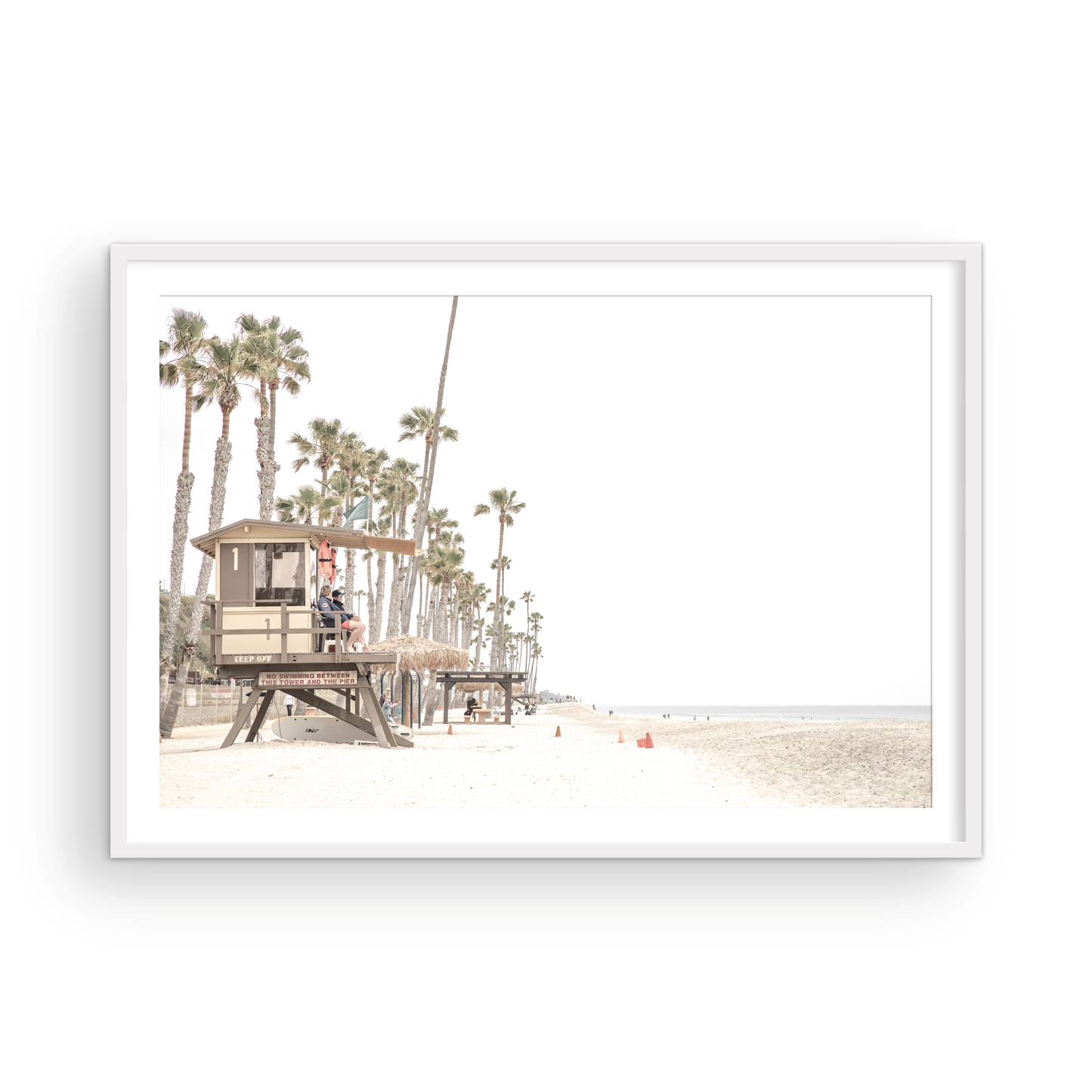 A wide landscape coastal photography view of San Clemente State Beach in Southern California, featuring a row of tall palm trees, a lifeguard tower, and people enjoying the calm beach. This image evokes Summer Vibes Wall Art and tropical beach print aesthetics. Photograph in minimalist mock up.