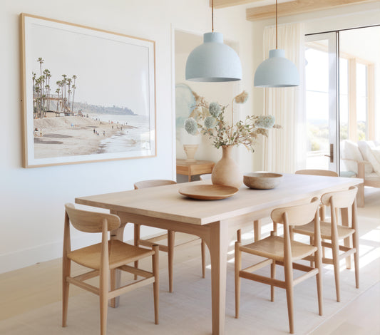 Landscape coastal photography of a wide sandy beach at San Clemente State Beach, with tall palm trees and people enjoying the calm ocean. Perfect for a beach theme wall decor. Photograph in minimalist mock up.