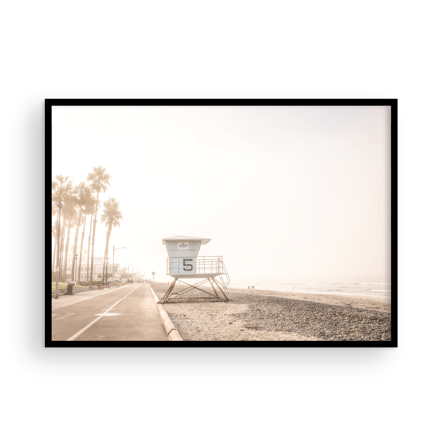 Landscape lifeguard tower photography of Oceanside, California, showing lifeguard tower number 5 on the beach with palm trees and a pathway leading towards the ocean. Photograph in minimalist mock up.