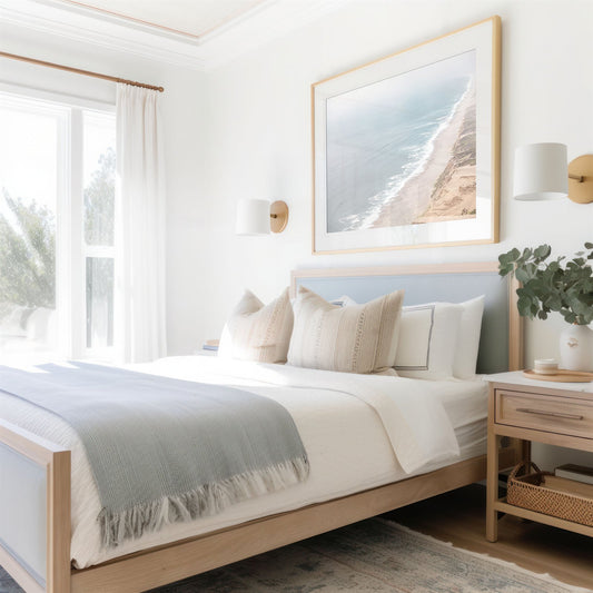 Framed photo of: Point Reyes Beach 7415 displayed above a bed in a coastal bedroom.