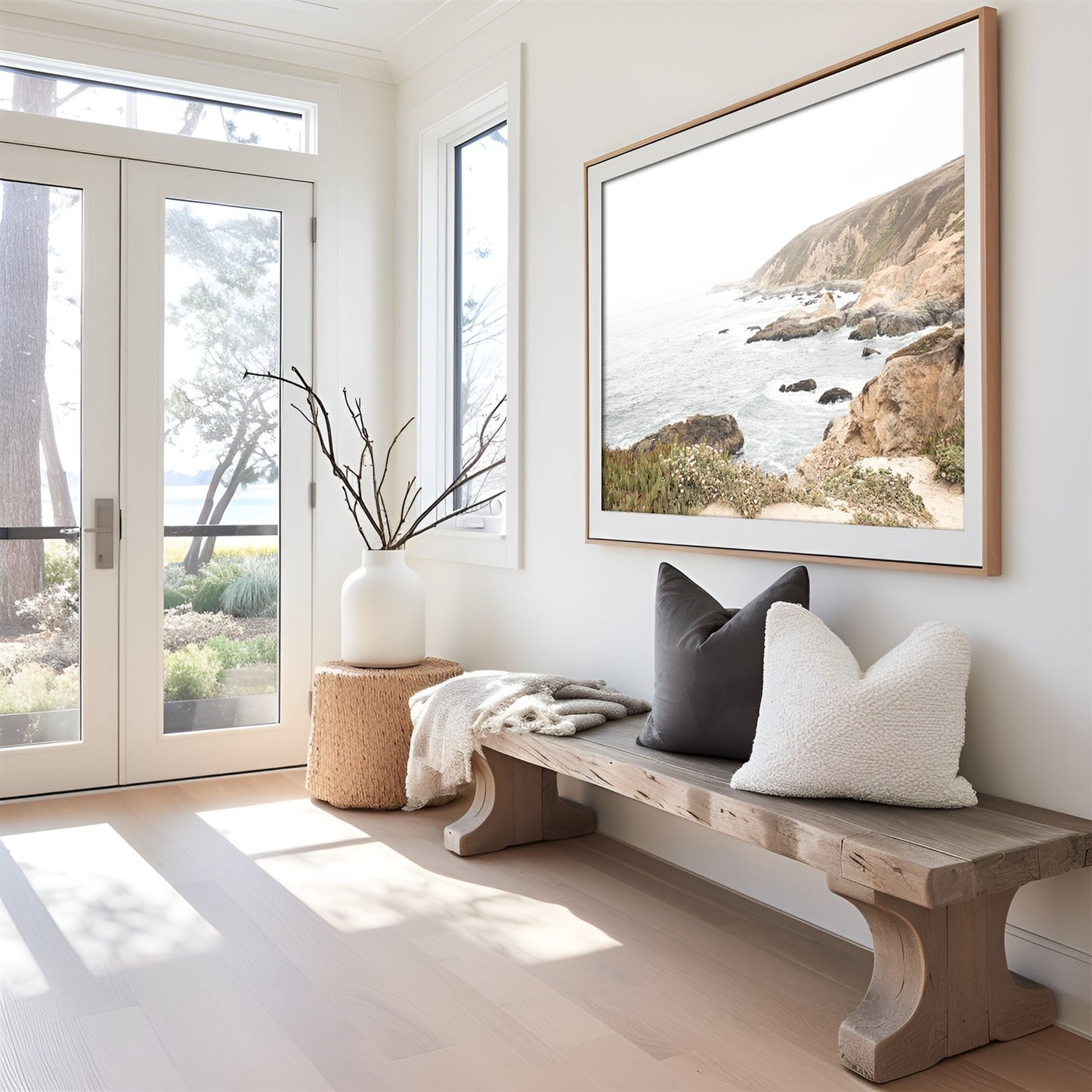 Framed photo of: Bodega Head 7728 displayed above a bench in an entry way.