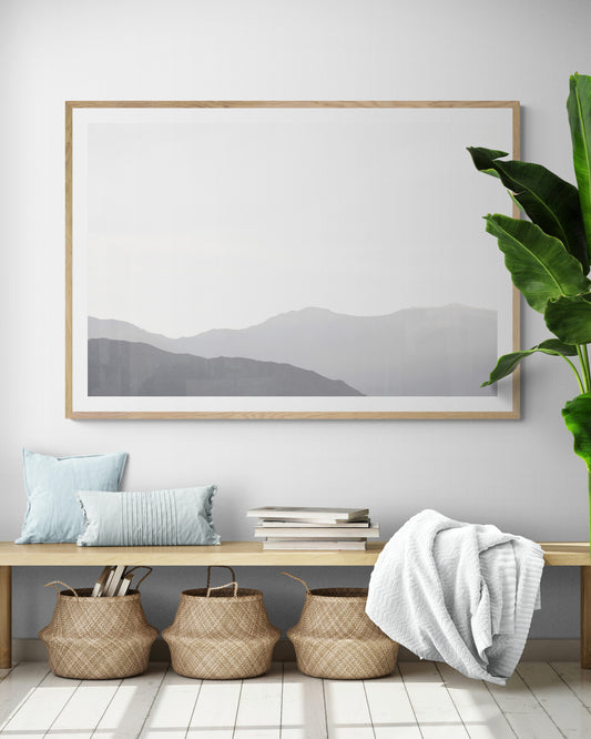 Minimalist horizontal art print of hazy mountains layered in soft tones. Located in Palms Springs, California. Photograph in minimalist mock up
