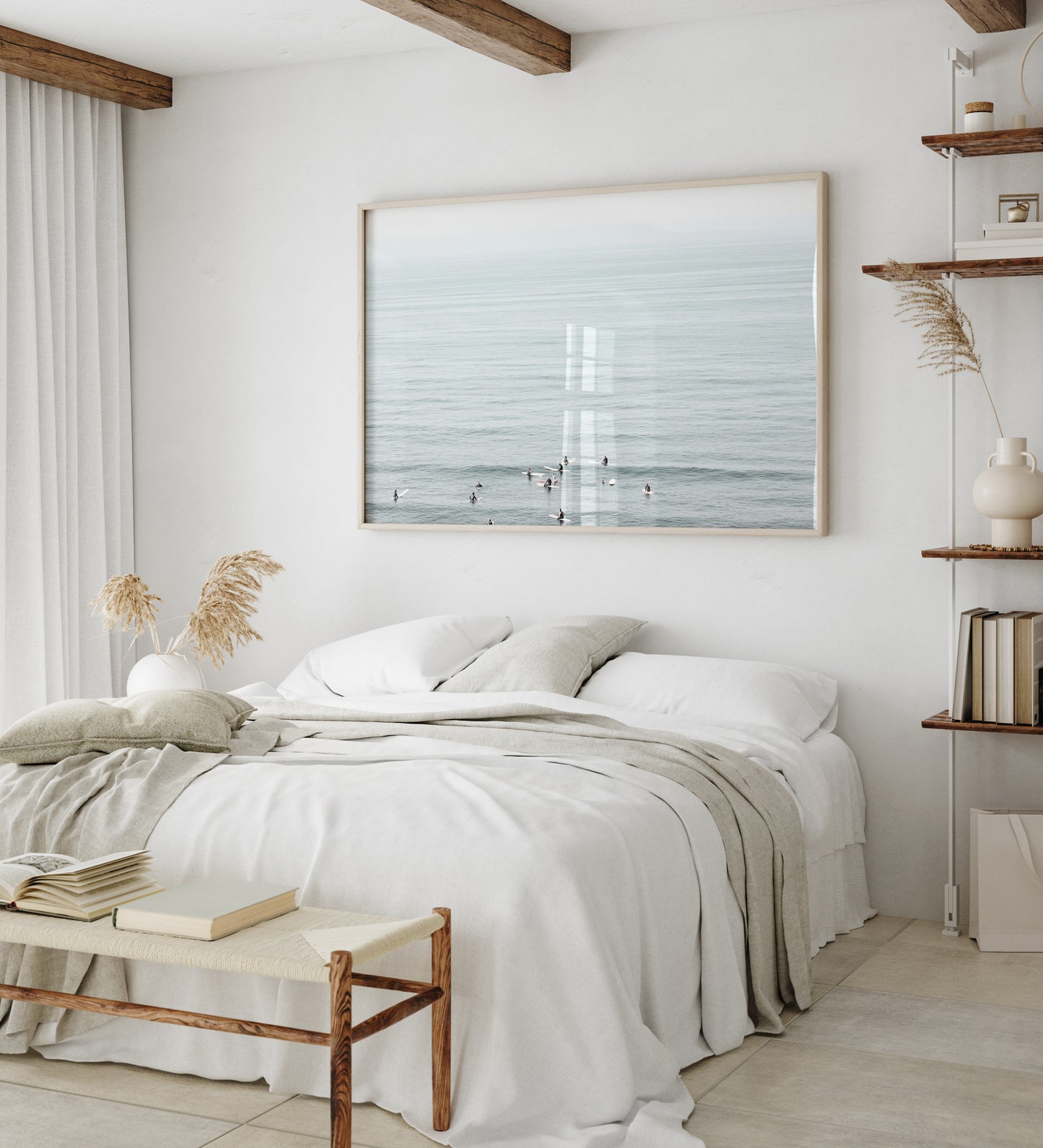 Horizontal surf art showing multiple surfers waiting in the calm ocean water for waves, with a hazy Southern California coastline in the distance. This minimalist surf print captures authentic surf vibes. Photograph in minimalist mock up.