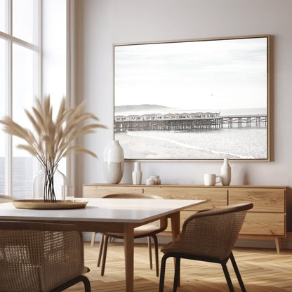 Landscape coastal photography of Crystal Pier in Pacific Beach, San Diego, extending into the calm ocean with gentle waves. Photograph in minimalist mock up