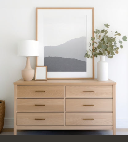 Minimalist vertical art print of hazy mountains layered in soft tones. Located in Palms Springs, California. Photograph in minimalist mock up