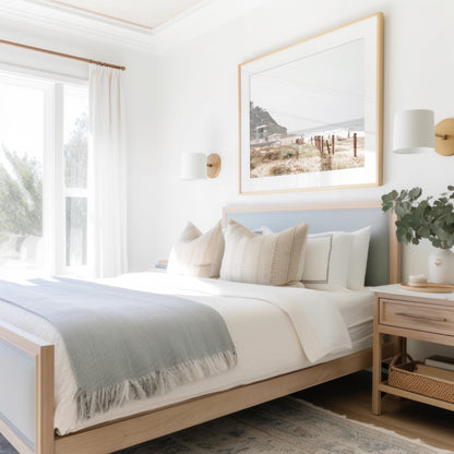 Landscape coastal photography of a light-colored lifeguard tower at a Southern California beach, with a rustic wooden fence leading towards the ocean waves. This tranquil beachscape print is ideal for beach cottage wall decor or a calm beach print. Photograph in minimalist mock up.