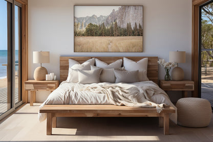 Fine art Yosemite Valley horizontal  landscape print by Southern California photographer Kim Dybczak of Salt Creek Prints, featuring a golden field and granite cliffs with with a valley in the mountains distance. Photograph in minimalist bedroom mock up