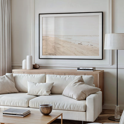 Fine art photograph of beige sand and white waves at Solana Beach hung on a wall