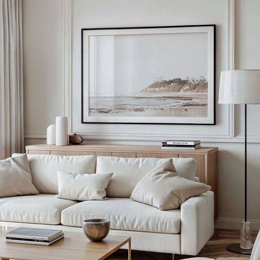 Framed Fine Art photograph of 
Swamis Beach above a couch