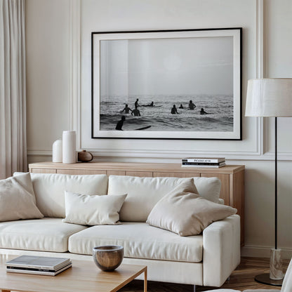 Framed photo of: Swamis 6683 displayed on a living room wall above a couch. 