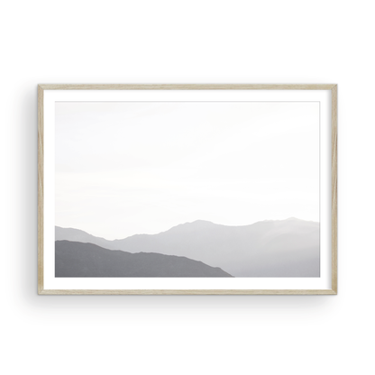 Minimalist horizontal art print of hazy mountains layered in soft tones. Located in Palms Springs, California. Photograph in minimalist mock up