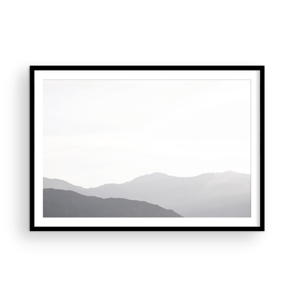Minimalist horizontal art print of hazy mountains layered in soft tones. Located in Palms Springs, California. Photograph in minimalist mock up