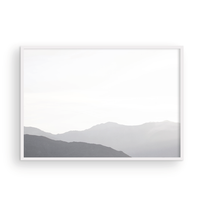 Minimalist horizontal art print of hazy mountains layered in soft tones. Located in Palms Springs, California. Photograph in minimalist mock up