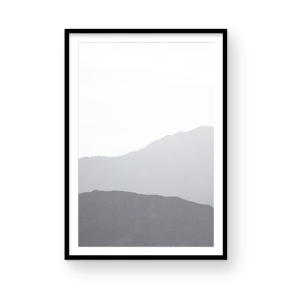 Minimalist vertical art print of hazy mountains layered in soft tones. Located in Palms Springs, California. Photograph in minimalist mock up