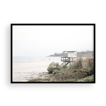 Landscape beach photography of Salt Creek Beach, with lifeguard tower SC 3 in the foreground, and many people enjoying the beach and ocean in the distance. A beach vibes print. Photograph in minimalist mock up.