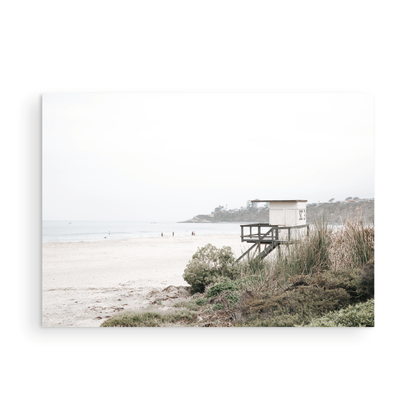 Landscape beach photography of Salt Creek Beach, with lifeguard tower SC 3 in the foreground, and many people enjoying the beach and ocean in the distance. A beach vibes print. Photograph in minimalist mock up.