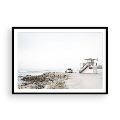 Landscape beach photography of Salt Creek Beach, with lifeguard tower SC 4 in the foreground, and many people enjoying the beach and ocean in the distance. A beach vibes print. Photograph in minimalist mock up.