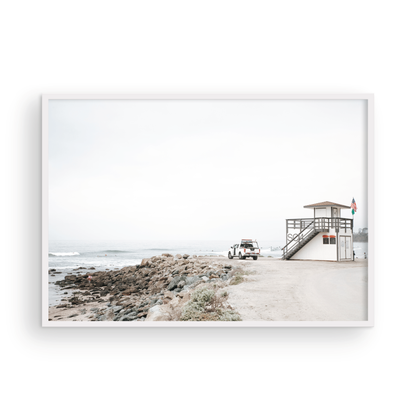 Landscape beach photography of Salt Creek Beach, with lifeguard tower SC 4 in the foreground, and many people enjoying the beach and ocean in the distance. A beach vibes print. Photograph in minimalist mock up.