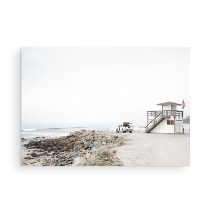 Landscape beach photography of Salt Creek Beach, with lifeguard tower SC 4 in the foreground, and many people enjoying the beach and ocean in the distance. A beach vibes print. Photograph in minimalist mock up.