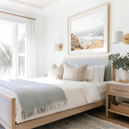 Fine art of Sunset Cliffs, San Diego California horizontal print of hazy high-angle landscape beach photography captures a light blue ocean meeting tall tan and brown cliffs rise as iconic coastal scenery. Photograph in minimalist mock up.