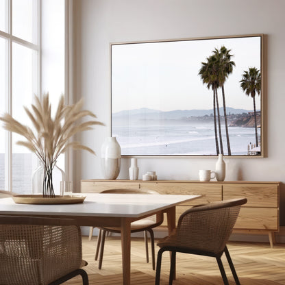 Landscape San Diego beach print showing a seascape with gentle ocean waves in the water and palm trees in the foreground. Photograph in minimalist mock up.