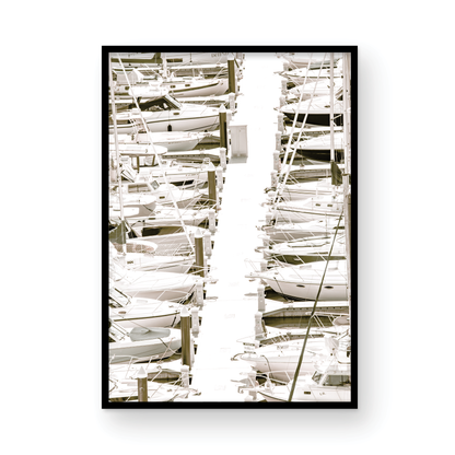 Vertical nautical wall print featuring a marina packed with white boats docked at the San Diego harbor. Photograph in minimalist mock up.