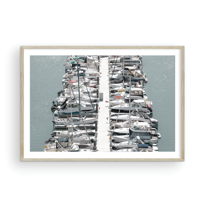 Horizontal nautical wall print featuring a marina packed with white boats docked at the San Diego harbor. Photograph in minimalist mock up.
