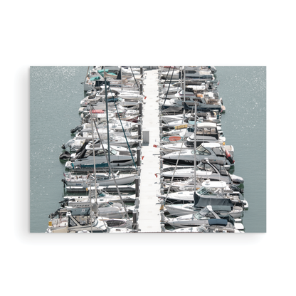 Horizontal nautical wall print featuring a marina packed with white boats docked at the San Diego harbor. Photograph in minimalist mock up.