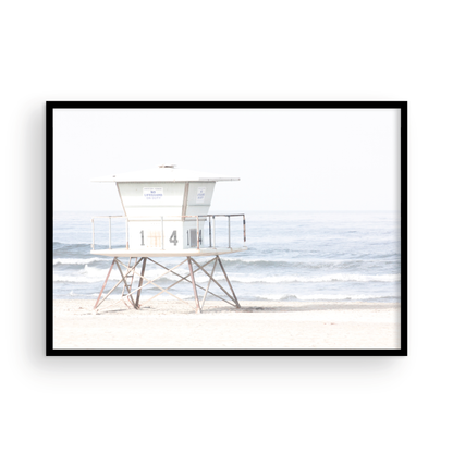 A horizontal beach art close-up of a pale lifeguard tower (14), with ocean waves in the distance, on a San Diego Beach. Photograph in minimalist mock up.