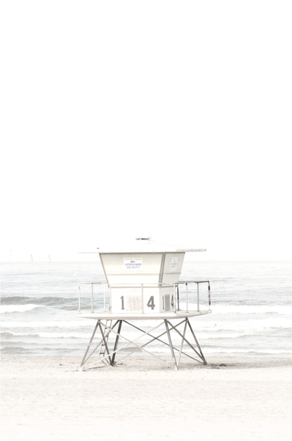 A vertical beach art close-up of a pale lifeguard tower (14), with ocean waves in the distance, on a San Diego Beach. 