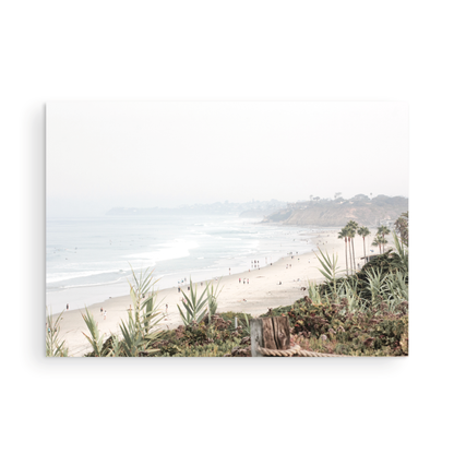 Landscape San Diego beach print showing seascape with gentle ocean waves in the water near a sandy cliff. Photograph in minimalist mock up.
