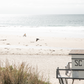 Landscape coastal photography of Salt Creek Beach Park featuring a lifeguard tower (SC 1) on the sand, with distant figures and ocean waves. This beachscape print has a calming vibe. 