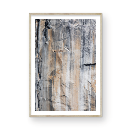 Fine art Yosemite Valley vertical  landscape print by Southern California photographer Kim Dybczak of Salt Creek Prints, featuring a multi colored granite cliff side. Photograph in minimalist mock up
