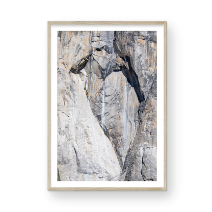 Fine art Yosemite Valley vertical  landscape print by Southern California photographer Kim Dybczak of Salt Creek Prints, featuring a multi colored granite cliff side. Photograph in minimalist mock up
