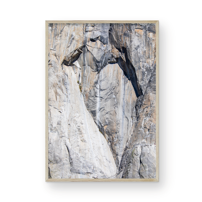 Fine art Yosemite Valley vertical  landscape print by Southern California photographer Kim Dybczak of Salt Creek Prints, featuring a multi colored granite cliff side. Photograph in minimalist mock up