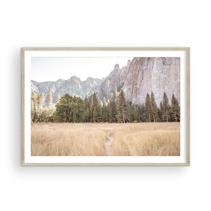 Fine art Yosemite Valley horizontal  landscape print by Southern California photographer Kim Dybczak of Salt Creek Prints, featuring a golden field and granite cliffs with with a valley in the mountains distance. Photograph in minimalist mock up