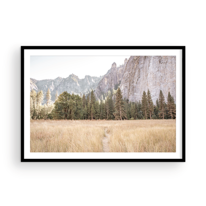Fine art Yosemite Valley horizontal  landscape print by Southern California photographer Kim Dybczak of Salt Creek Prints, featuring a golden field and granite cliffs with with a valley in the mountains distance. Photograph in minimalist mock up