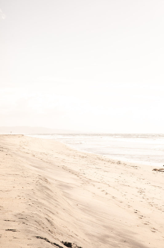 Photography by Kim Dybczak of: Fine art photograph of beige sand and white waves at Solana Beach
