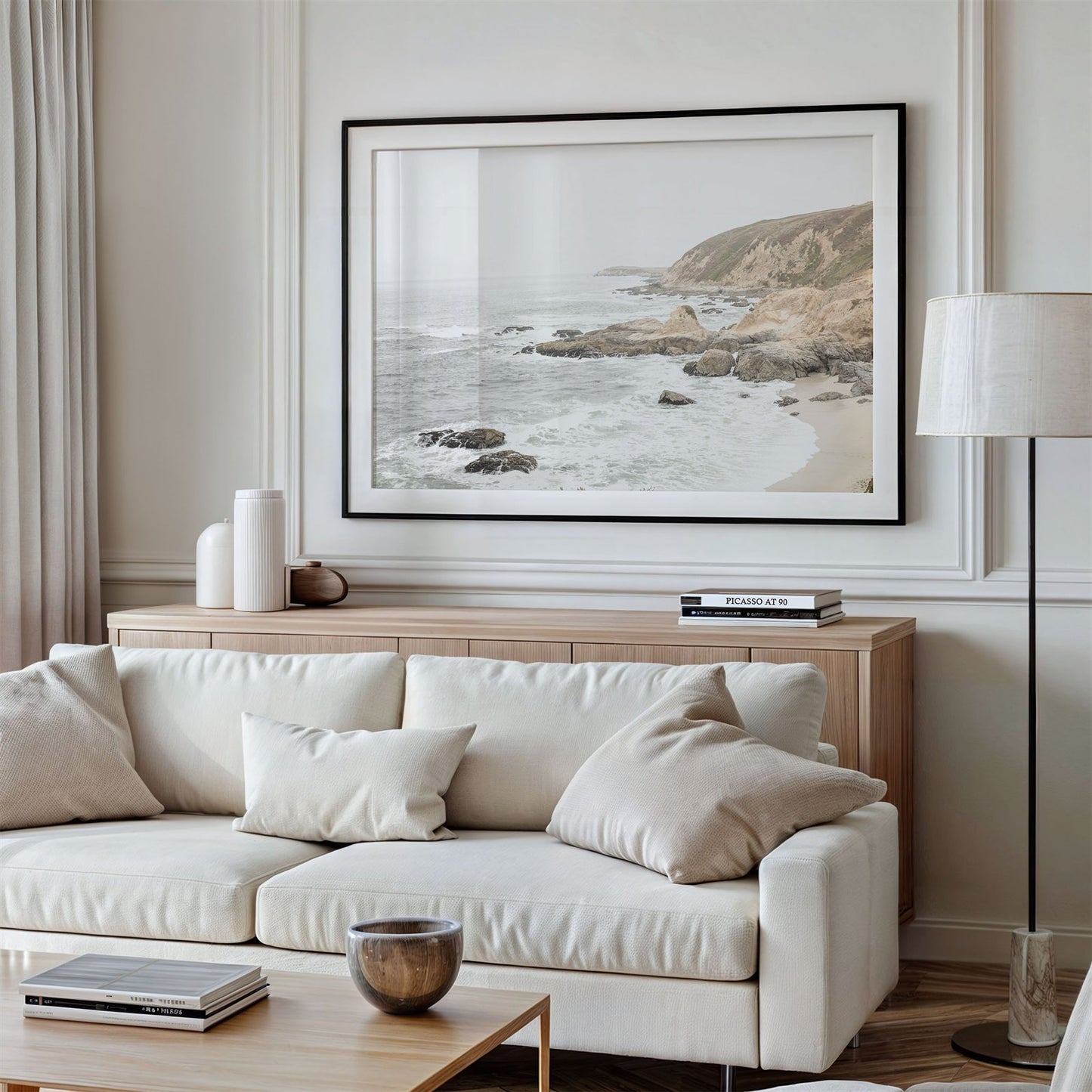 Framed photo of: Bodega Head 7711 displayed above a couch in a modern living room.