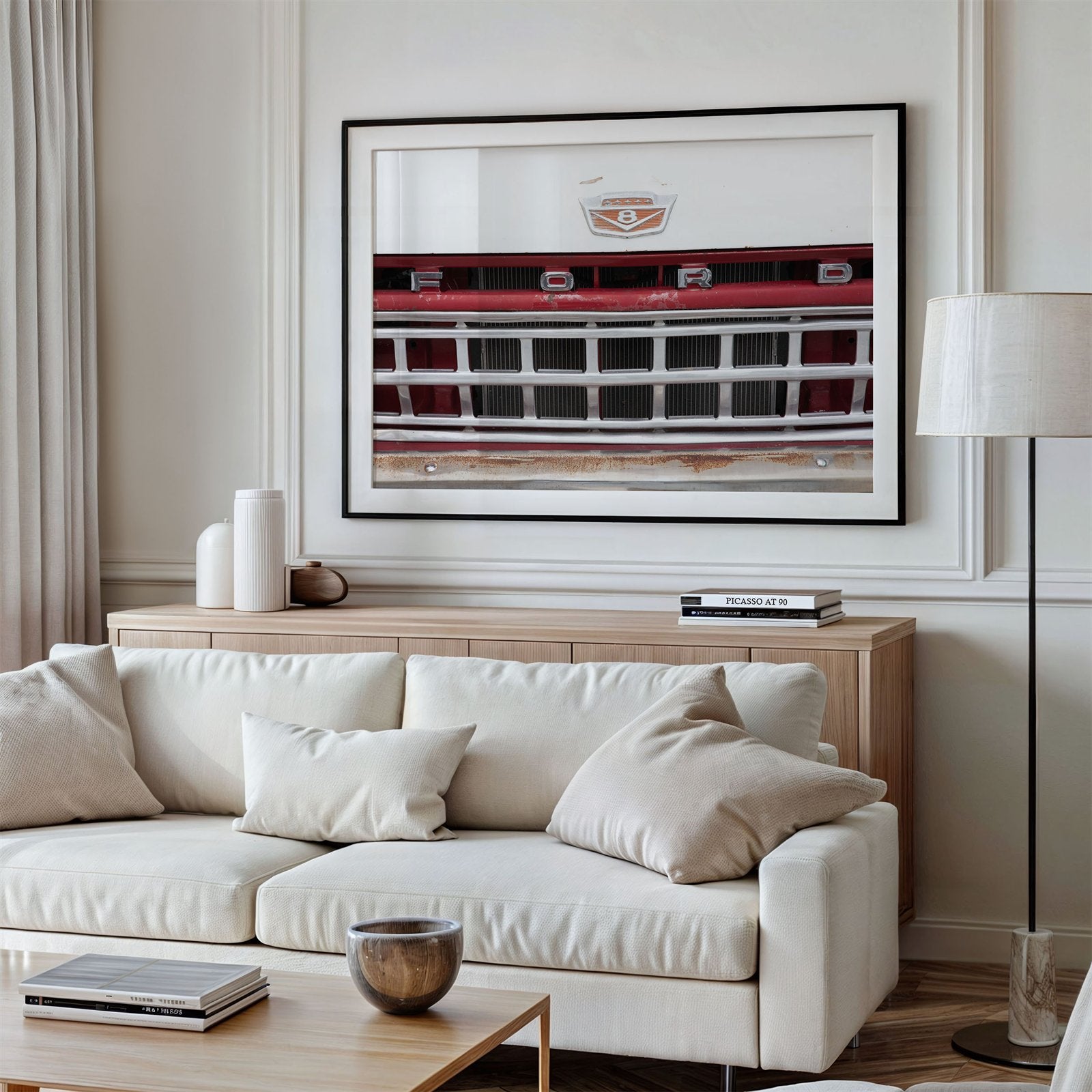Framed photo of: Ford Truck 8384 displayed above a couch in a modern living room.