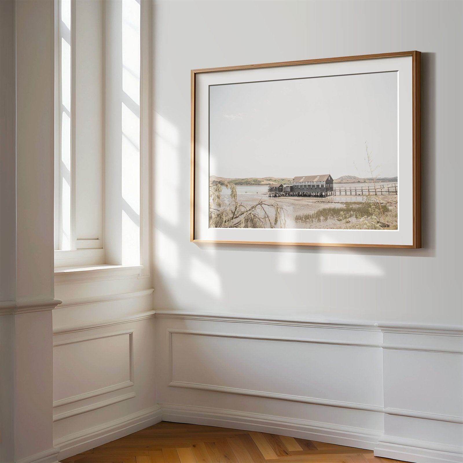 Framed photo of: Tomales Bay 7146 displayed on a wall in a luxury hallway.