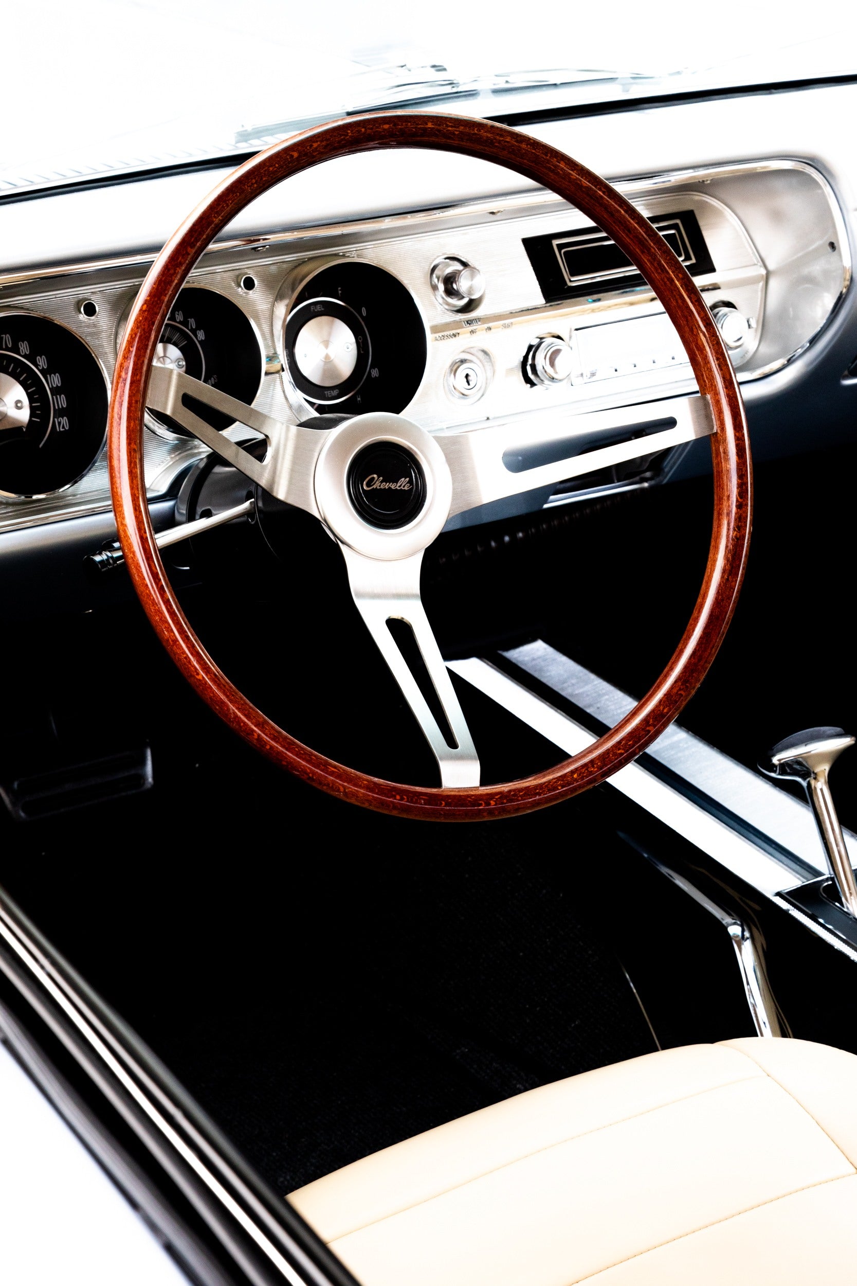 Photography by Salt Creek Prints of: Chevelle 7916, Close up image of the steering wheel and dash of a vintage Chevy Chevelle. 